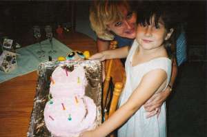My Daughter with Cat Cake (c) copyright Sherri Matthews 2013
