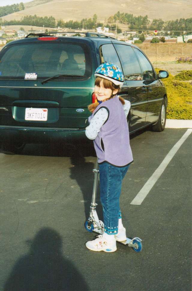 Aspie D enjoying a day out on her scooter Beach walk just off the Pacific Coast Highway, Morro Bay, California 1990's (c) Sherri Matthews 2014